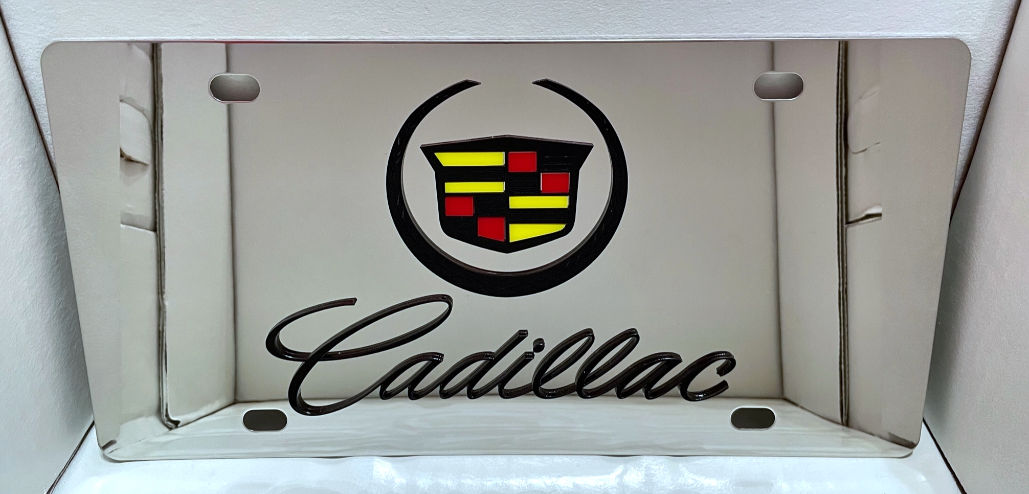 Cadillac script and emblem vanity license plate